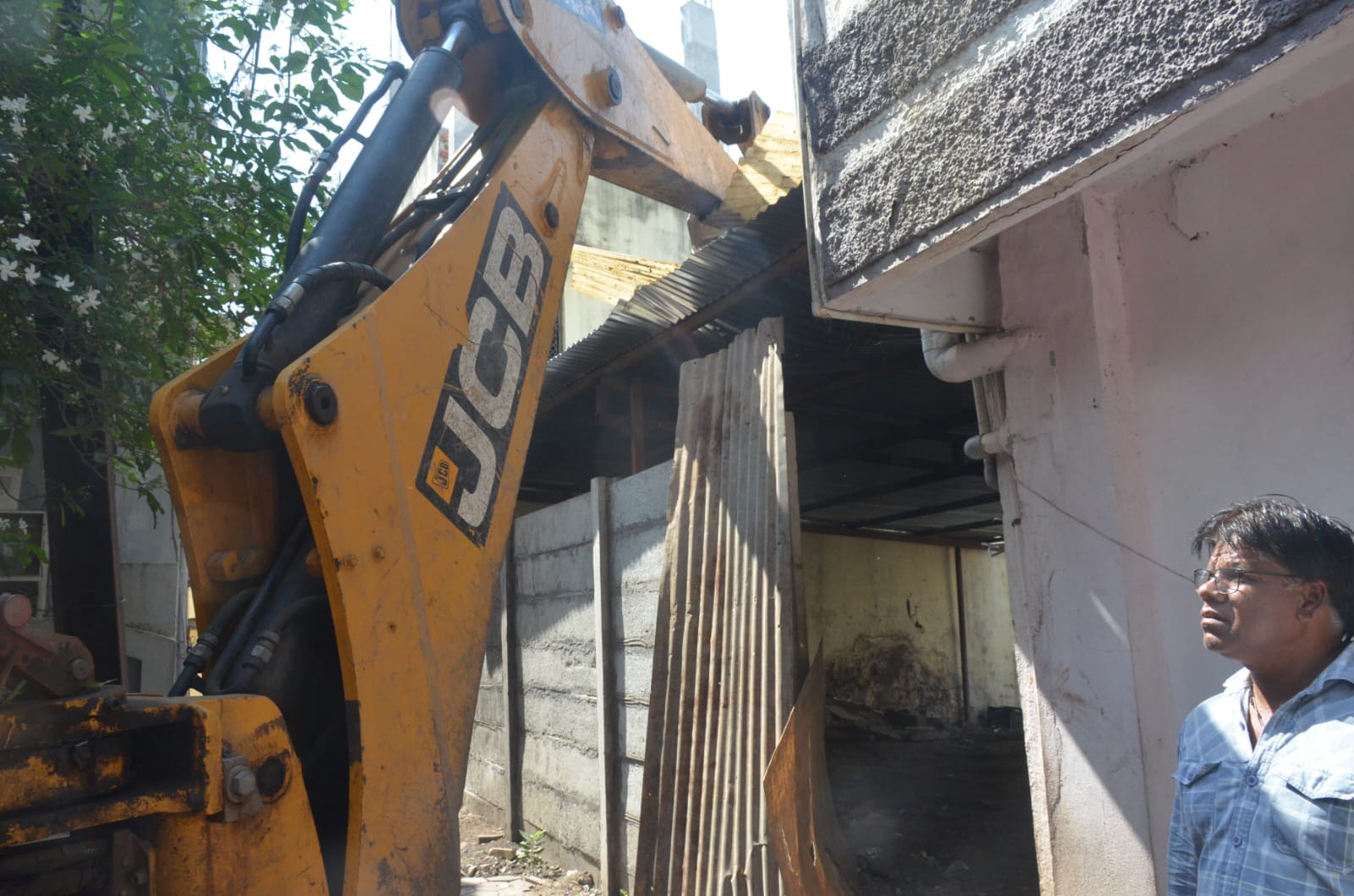 Bulldozer Hits Animal Shed